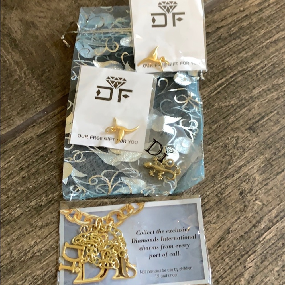Diamonds international charm bracelet